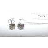 A pair of 18ct gold diamond stud earrings - diamon