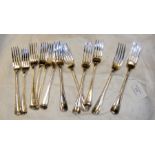 The matching set of twelve silver dessert forks -