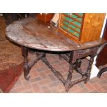 Antique carved oak drop-leaf table