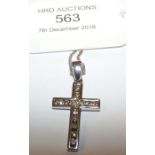 An 18ct white gold diamond set cross and chain - a