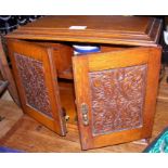 Antique carved smoker's cabinet