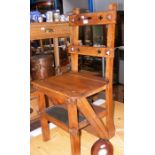 An antique oak metamorphic chair