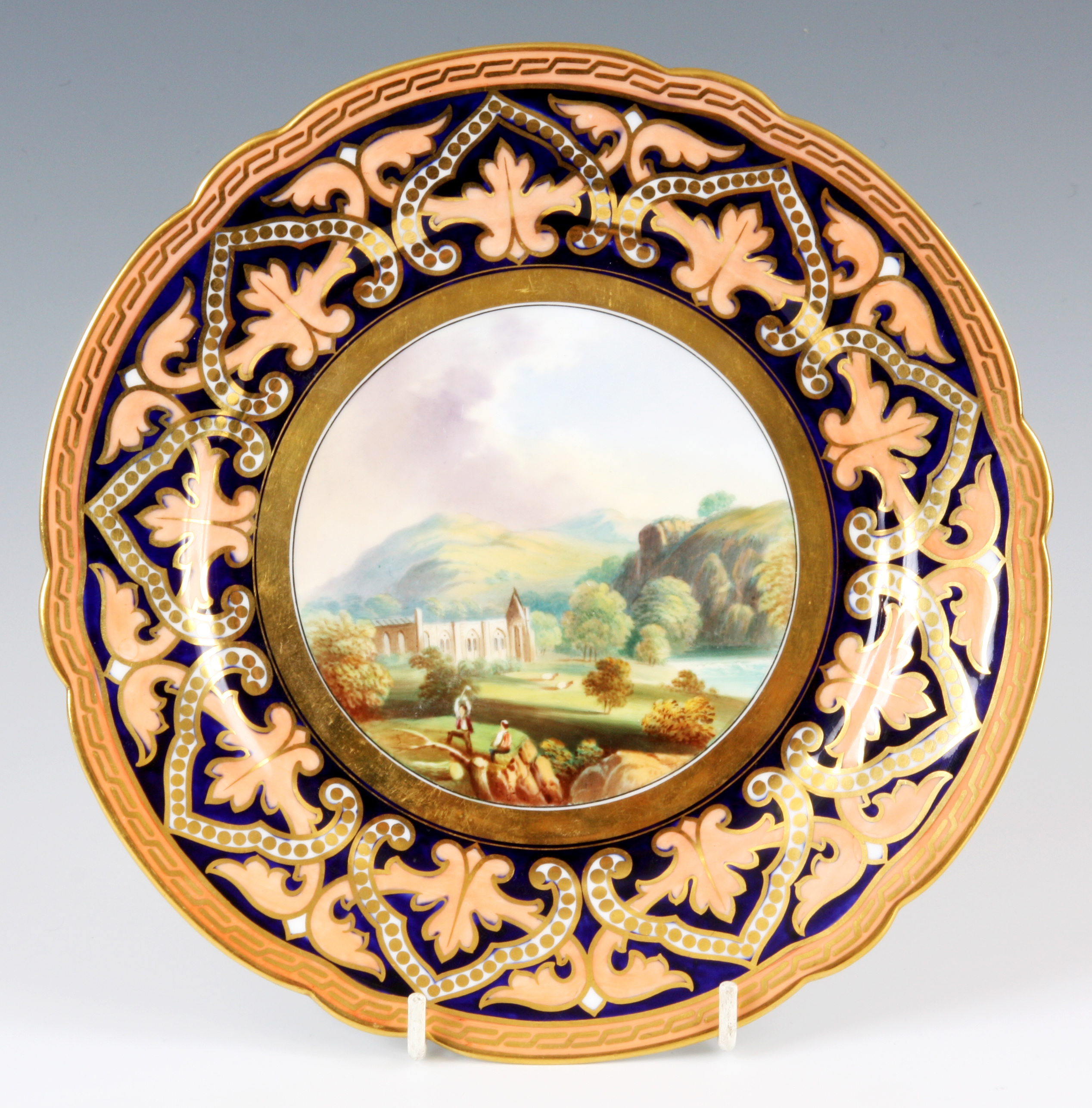 A LATE 19TH CENTURY SAMUEL ALCOCK CABINET PLATE with a hand-painted scene of Bolton Abbey 23cm