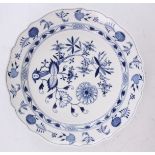 A LARGE MEISSEN BLUE AND WHITE SCALLOP EDGE SHALLOW DISH decorated in the blue onion pattern 43.