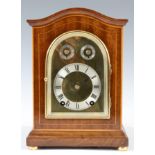 A SMALL EARLY 20th CENTURY GERMAN MAHOGANY MANTEL CLOCK BY WINTERHALDER & HOFMEIER the case with