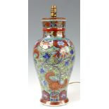 A LATE 17th CENTURY KANG HSI CHINESE VASE converted to a lamp with later polychrome decoration