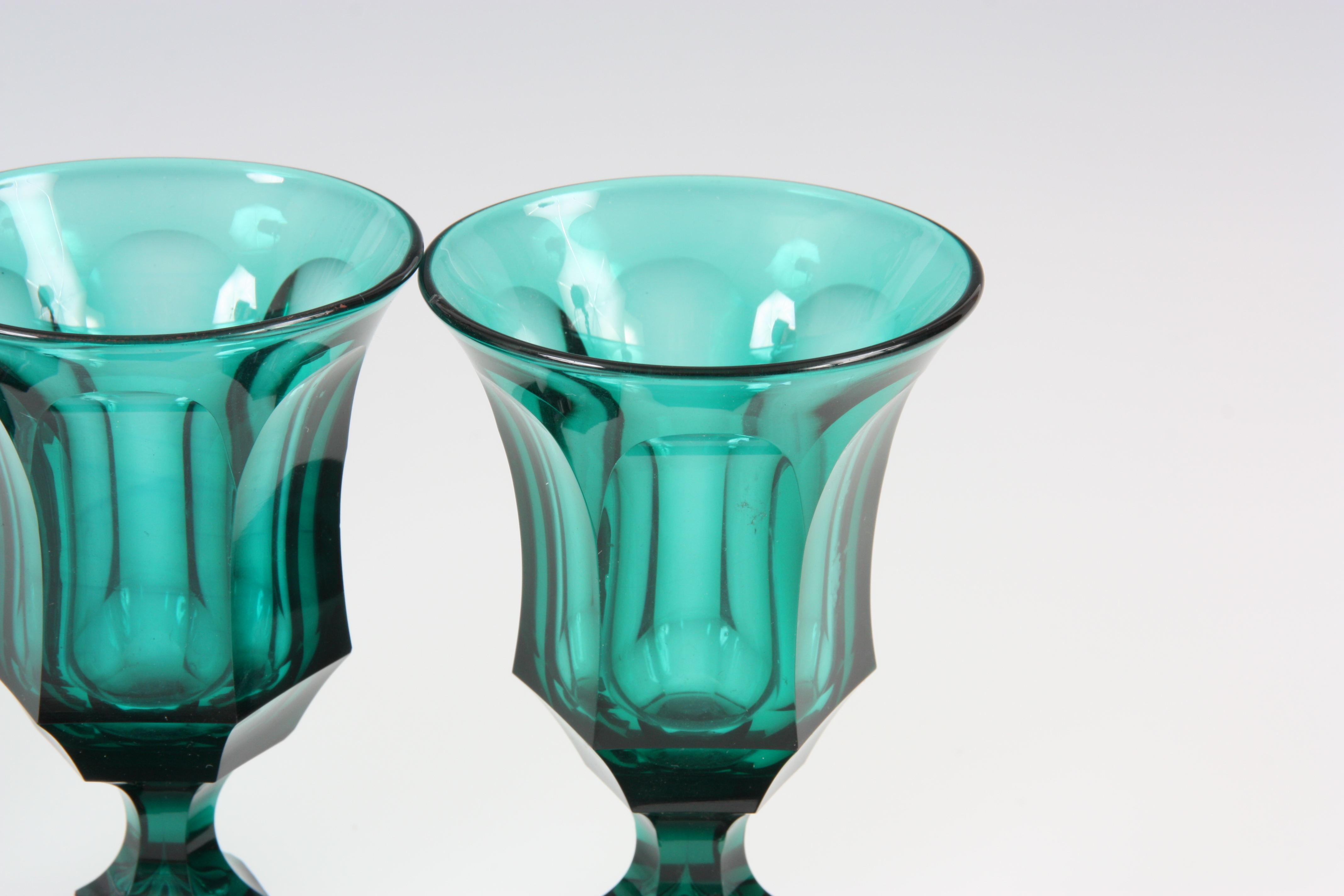 A SET OF SIX LATE 19TH CENTURY GREEN STAINED WINE GLASSES of chamfered hexagonal form 13cm high. - Image 2 of 5