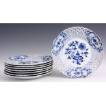 A SET OF EIGHT MEISSEN BLUE AND WHITE LATTICE EDGED DINNER PLATES decorated in the blue onion