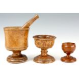 A SELECTION OF 19th CENTURY TREEN to include a fruitwood pestle and mortar, a mulberry goblet and