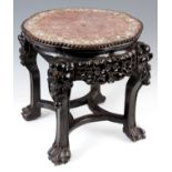 A 19TH CENTURY CHINESE CARVED HARDWOOD JARDINIERE STAND with mother of pearl inlays and marble top