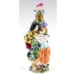 A CONTINENTAL PORCELAIN SCENT BOTTLE modelled as children picking flowers around a tree with their