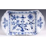 A MEISSEN BLUE AND WHITE SHAPED RECTANGULAR SIDE HANDLED SHALLOW DISH decorated in the blue onion