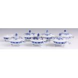 A SET OF SEVEN MEISSEN BLUE AND WHITE HORS D'OEUVRE DISHES and six covers with bird’s head side