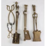 A SELECTION OF 19th CENTURY BRASS FIRE IRONS AND TONGS of various designs.