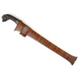 A 19th CENTURY HUNTING KNIFE, POSSIBLY PERSIAN, WITH CARVED HORN HANDLE the curved steel single