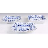 A PAIR OF MEISSEN SHAPED BLUE AND WHITE SHALLOW SQUARE DISHES and A SIMILAR SQUARE DISH, each