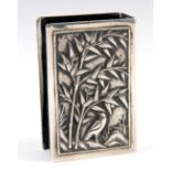 A MEIJI PERIOD JAPANESE SILVER METAL VESTA CASE with embossed bamboo and bird decoration, stamped