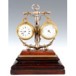 A LATE 19th CENTURY FRENCH INDUSTRIAL MANTEL CLOCK AND BAROMETER DESK CLOCK in the form of an anchor