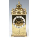 AN EARLY 20th CENTURY FRENCH BRASS CASED MANTEL CLOCK with engraved seascapes having boats and birds