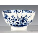 AN 18TH CENTURY FIRST PERIOD WORCESTER FLUTED BOWL ‘THE HOLLOW ROCK LILY’ PATTERN signed with the