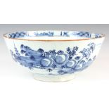 A LARGE EARLY 18th CENTURY DELPH BLUE AND WHITE BOWL the body decorated with oriental country