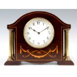 AN EARLY 20th CENTURY FRENCH MAHOGANY CASED MANTEL CLOCK with boxwood inlaid decoration and brass