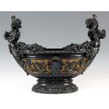 A LARGE EARLY 20TH CENTURY TERRACOTTA JARDINIERE elaborately decorated with a pair of flower