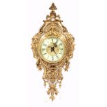 A LATE 19th CENTURY FRENCH ORMOLU CARTEL CLOCK with rococo style case enclosing a 5" enamel dial