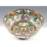 A 19TH CENTURY CANTON BOWL brightly painted with village scenes and floral decoration 8cm high