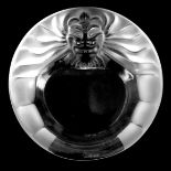 A LALIQUE LIONS HEAD GLASS CIRCULAR PIN TRAY signed Lalique France 14.5cm diameter.