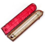 ANTONY GATTY, FISHER ROW, READING A REGENCY TRAVELLING THERMOMETER IN MOROCCAN LEATHER CASE the