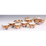 AN EARLY 19TH CENTURY SPODE TYPE PORCELAIN PART TEA SERVICE comprising teapot, oval two handled