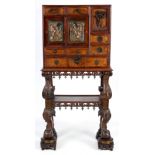 A 19TH CENTURY CHINESE HARDWOOD COLLECTORS CABINET ON STAND, consisting of small drawers and sliding