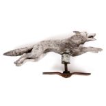 A MID 20th CENTURY SILVERED BRONZE CAR MASCOT formed as a running fox 21.5cm long.