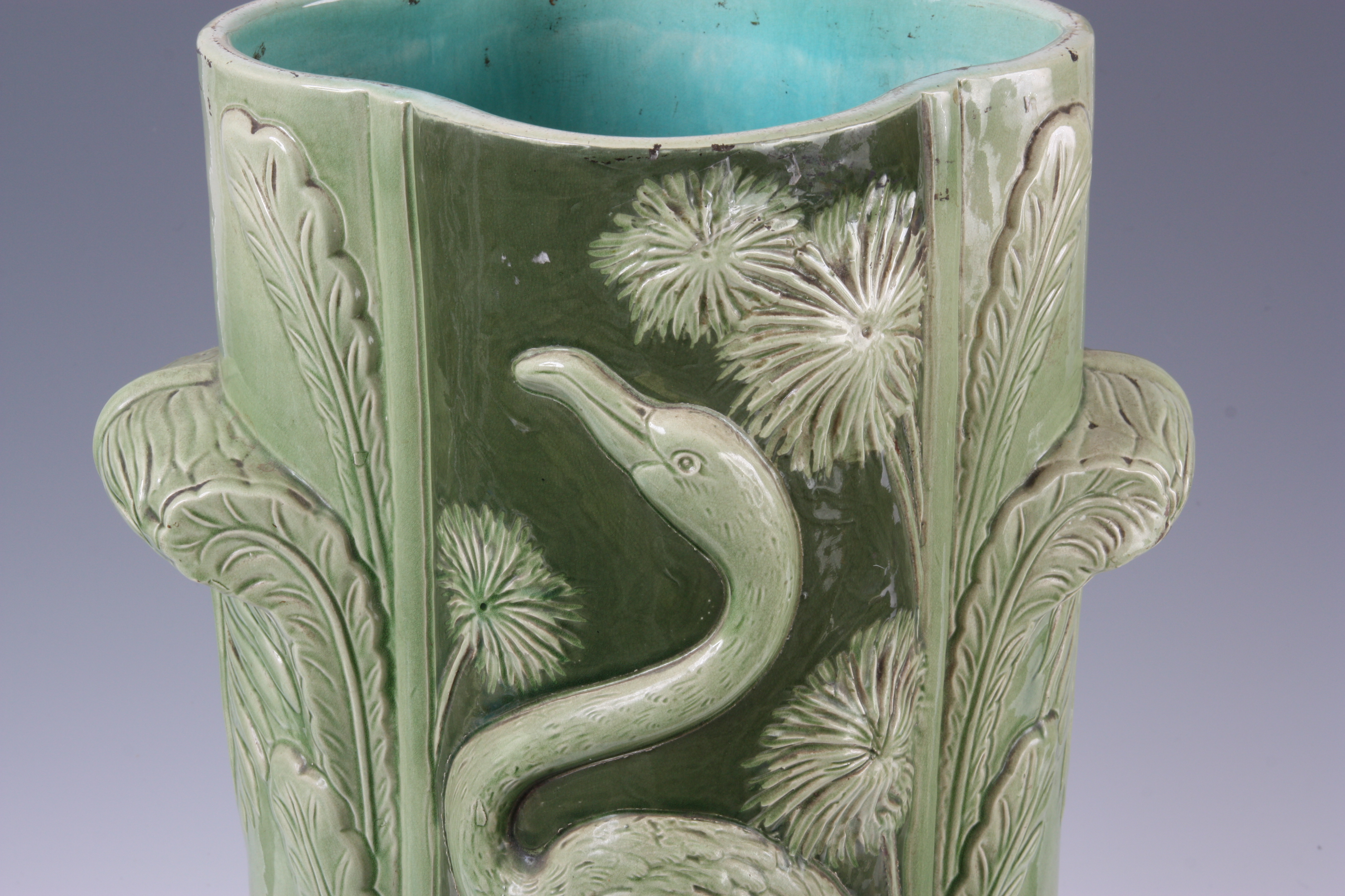 A LATE 19th CENTURY ENGLISH MAJOLICA UMBRELLA STAND flamingo pattern in pale green 60cm high. - Image 2 of 4