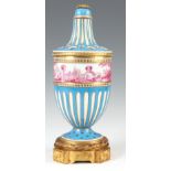 A MID 18TH CENTURY VINCENNES ORMOLU MOUNTED PORCELAIN URN SHAPED ROSE VASE AND COVER with fluted