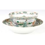 A 19TH CENTURY CHINESE POLYCHROME SCALLOP EDGE DEEP MOULDED LARGE TEA BOWL AND SAUCER with enamelled