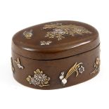 A MEIJI PERIOD JAPANESE PATINATED BRONZE LIDDED OVAL BOX with silver and gilt decoration depicting