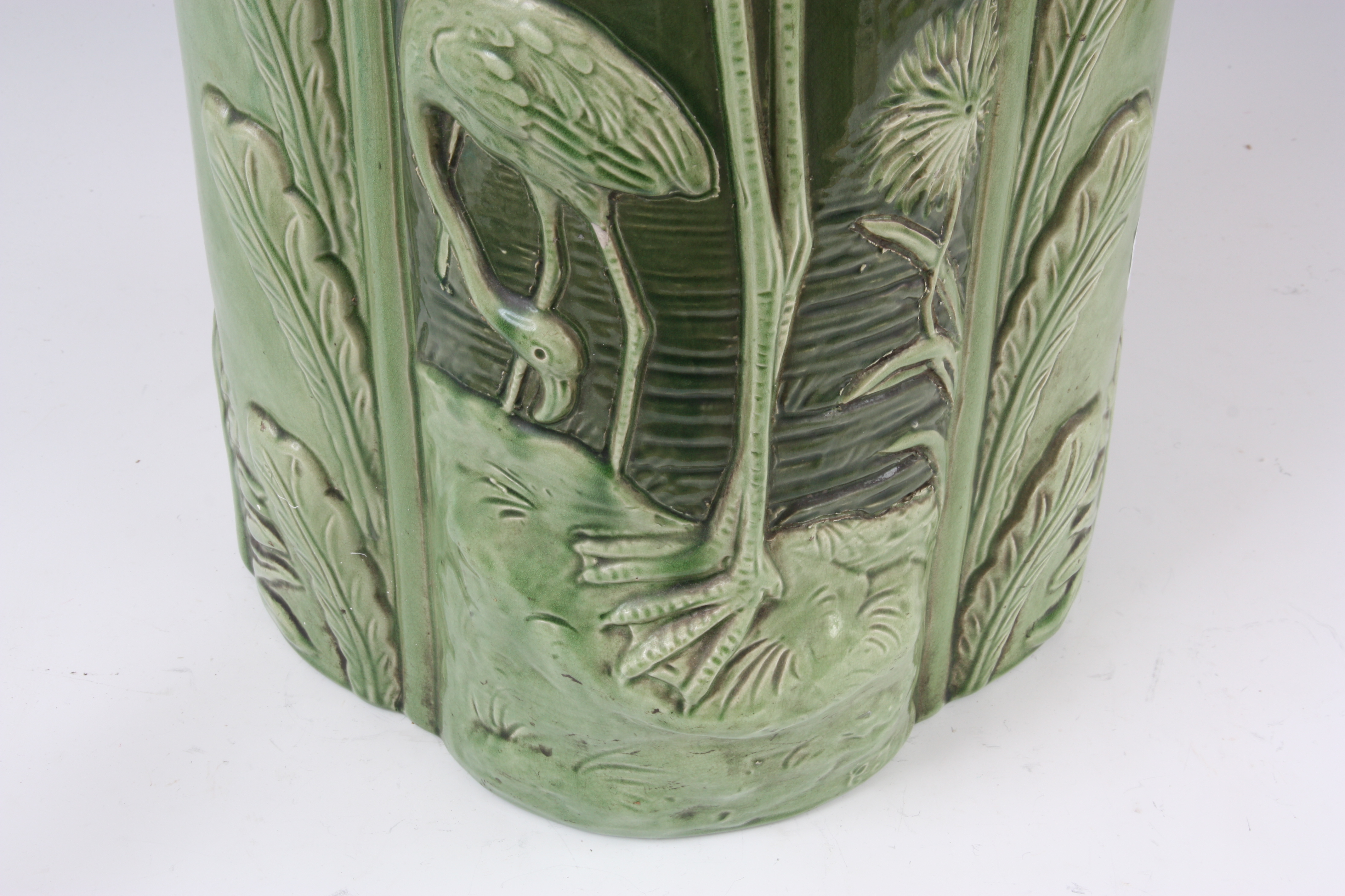 A LATE 19th CENTURY ENGLISH MAJOLICA UMBRELLA STAND flamingo pattern in pale green 60cm high. - Image 3 of 4