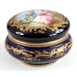 A LATE 19TH CENTURY SERVES ROYAL BLUE AND GILT PAINTED DRESSING TABLE JAR AND COVER the top