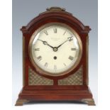 A LATE 19th CENTURY ENGLISH FUSEE MAHOGANY BRACKET CLOCK the arched pad top case with brass carrying