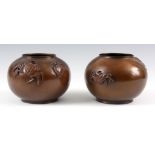 A PAIR OF MEIJI PERIOD JAPANESE BROWN PATINATED GLOBULAR VASES with applied crab decoration both