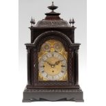 A LATE 19th CENTURY TRIPLE FUSEE EIGHT BELL BRACKET CLOCK the dark mahogany case with carved tile