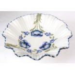A MOORCROFT MACINTYRE DISH of ribbed shaped design, tubeline decorated with blue  Poppy's -