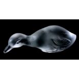 A FRENCH BACCARAT GLASS MODEL OF A DUCK - stamped to the underside 13.5cm across.