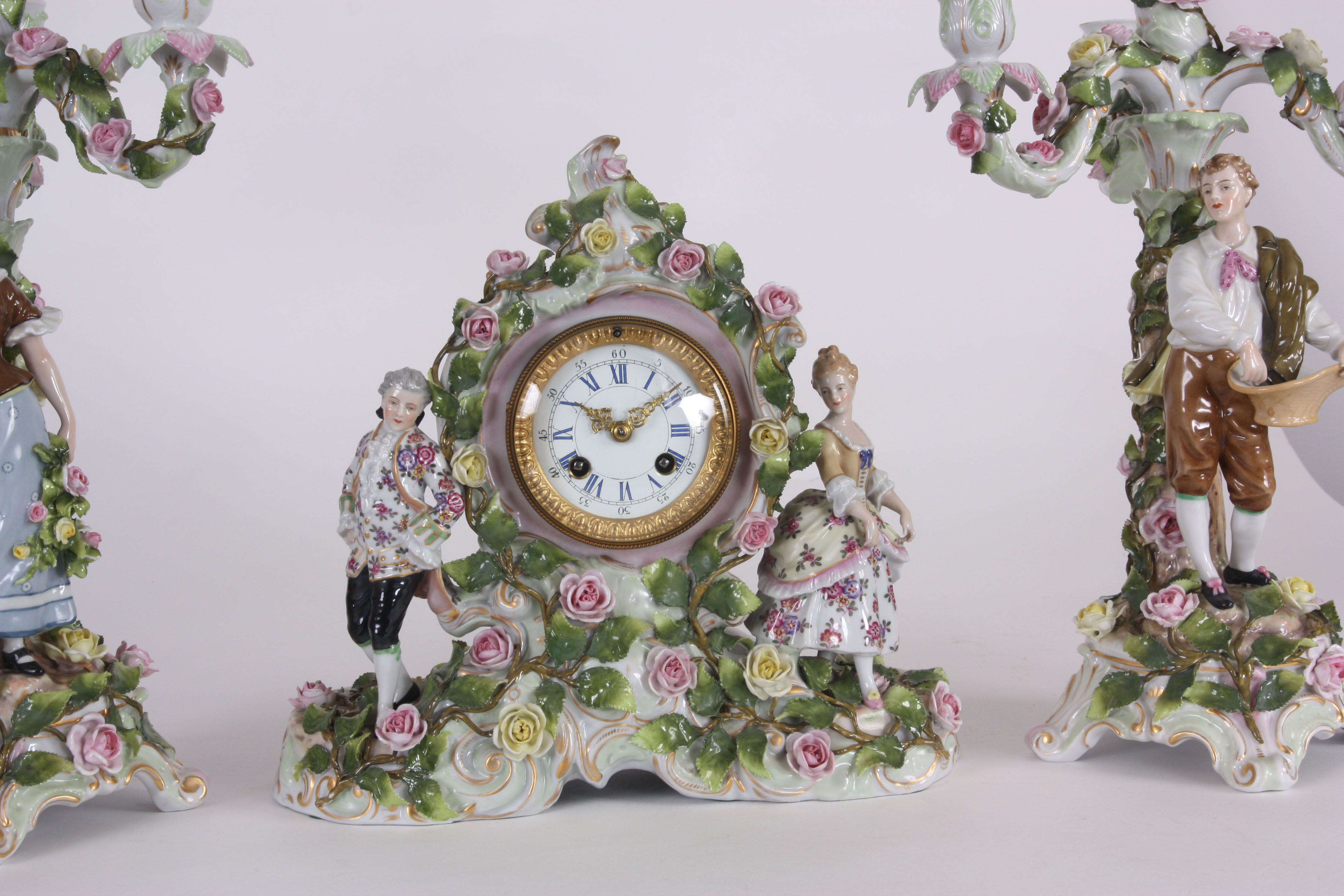 A LATE 19th CENTURY SCHIERHOLZ PORCELAIN CLOCK GARNITURE  with classical figures and applied rose - Image 2 of 4