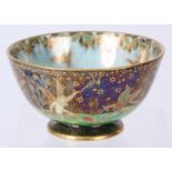 AN EARLY 20TH CENTURY WEDGEWOOD "FAIRYLAND" LUSTRE BOWL decorated with dancing fairies, pigmies