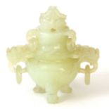 A LIGHT GREEN CHINESE JADE INCENSE BURNER finely carved with dragon head side handles and lid;
