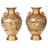A LARGE PAIR OF LATE 19th CENTURY SIGNED JAPANESE SATSUMA VASES of baluster form with Foo dog head