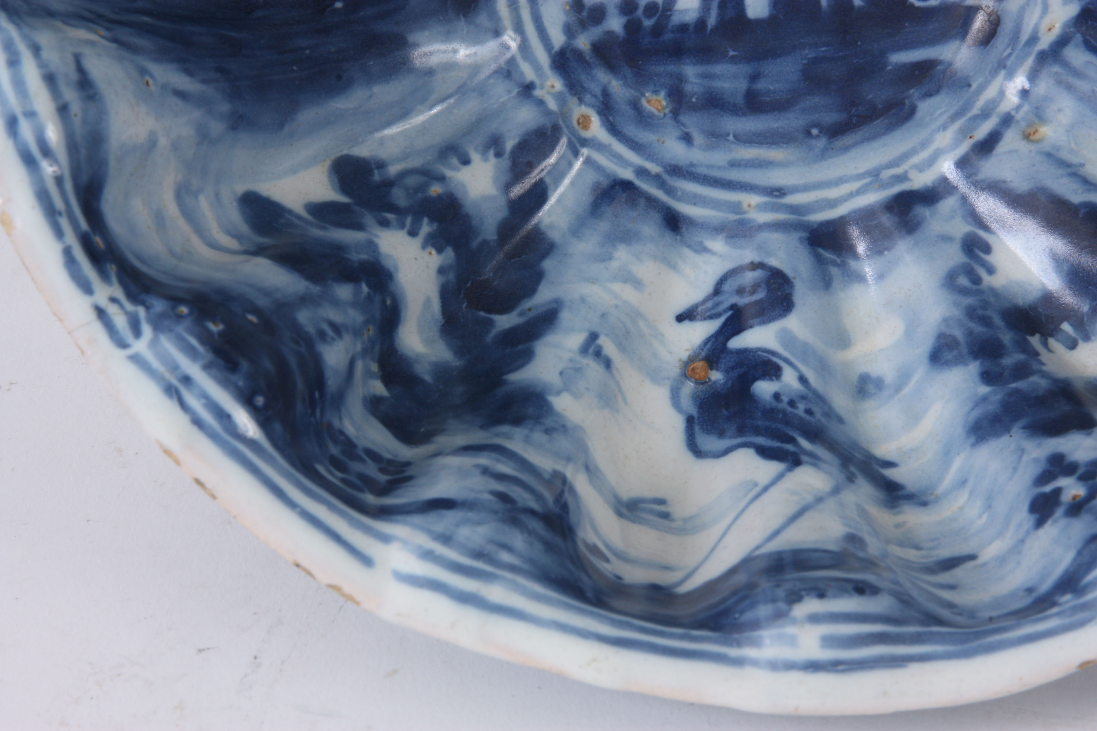 A 19TH CENTURY BLUE AND WHITE ITALIAN FAIENCE POTTERY  BOWL of reeded shaped form decorated with - Image 4 of 7